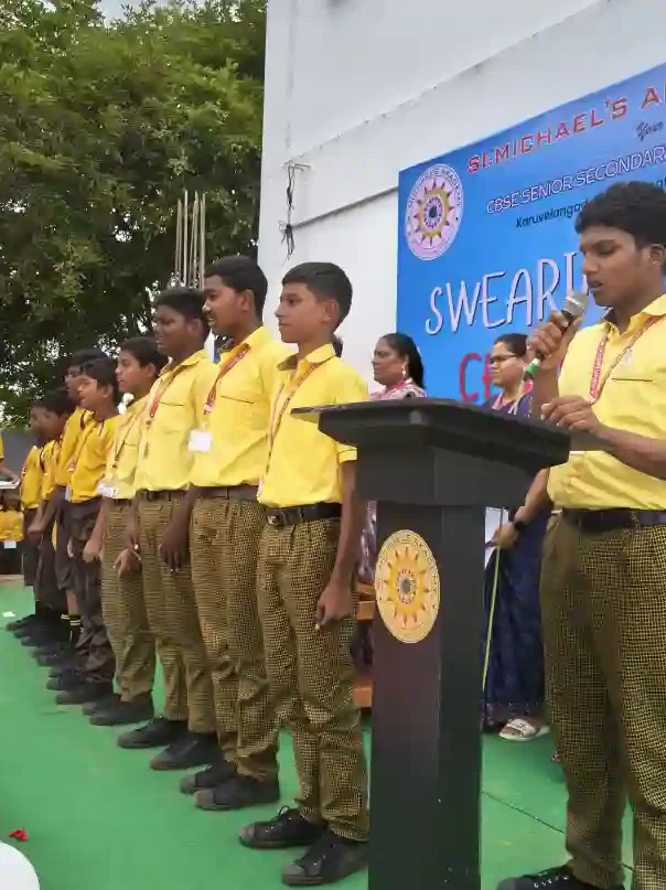 School Principal Addressing the Swearing-In Ceremony - Leadership and Action